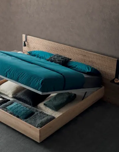 Cama de matrimonio con cabecero ranurado y arcón abatible